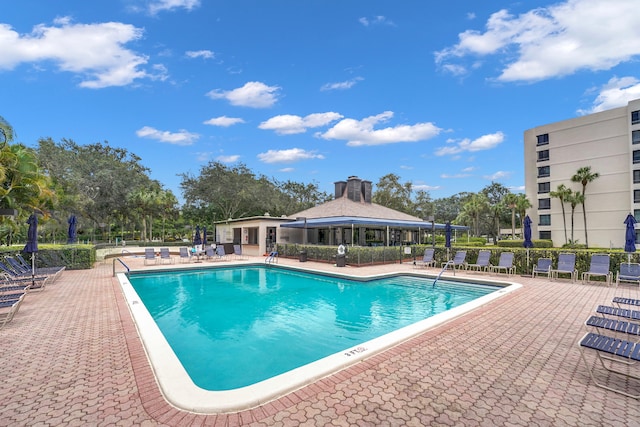 view of swimming pool with a patio