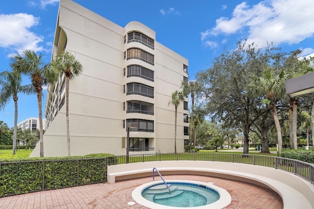 view of pool featuring a community hot tub