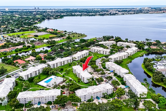 drone / aerial view featuring a water view