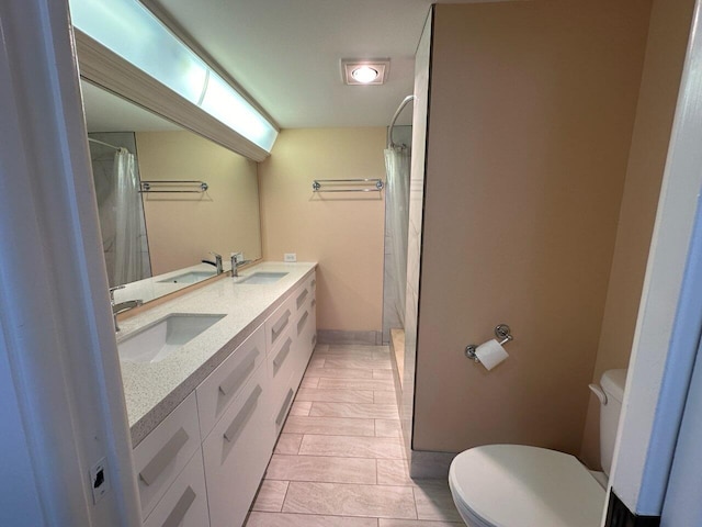 bathroom with toilet, a shower with shower curtain, and tile patterned floors