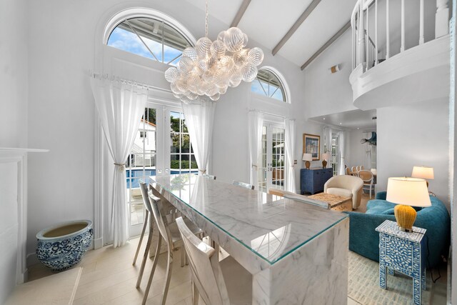 dining area featuring french doors, high vaulted ceiling, beamed ceiling, and a notable chandelier