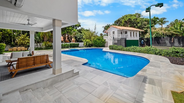 view of swimming pool featuring an outdoor living space, a patio, and ceiling fan