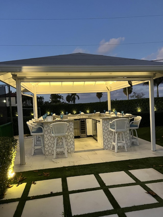 7515-7425 S Flagler Dr, West Palm Beach, FL 33405 - view of patio / terrace featuring a gazebo and wine cooler