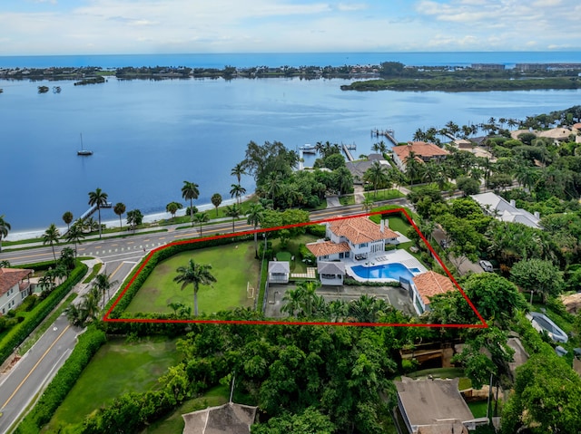 7515-7425 S Flagler Dr, West Palm Beach, FL 33405 - aerial perspective of suburban area with a large body of water, property parcel outlined, and a pool