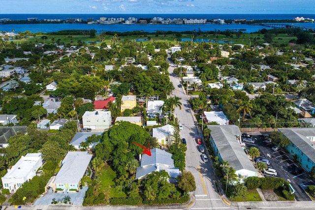 birds eye view of property featuring a water view