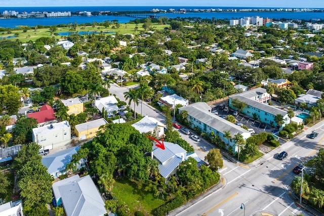 drone / aerial view with a water view