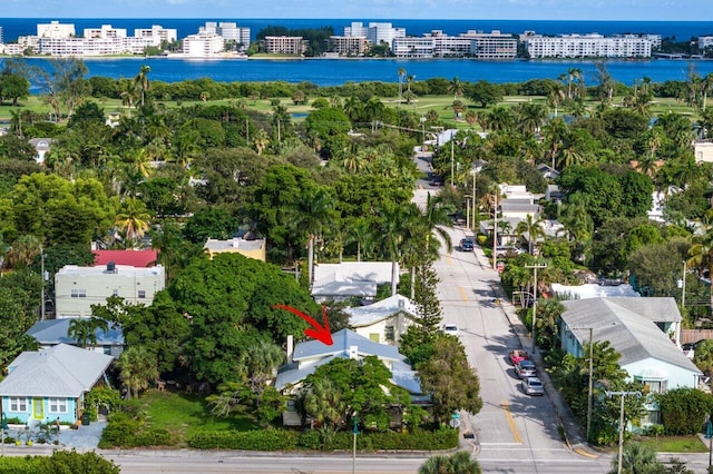 birds eye view of property featuring a water view