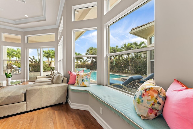 sunroom with a tray ceiling