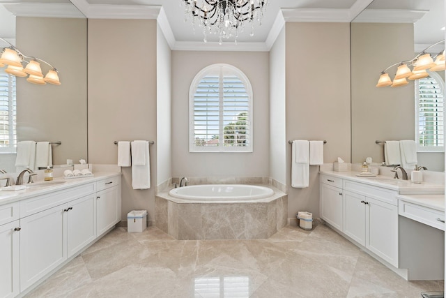 bathroom featuring tiled tub, tile patterned flooring, vanity, and a healthy amount of sunlight