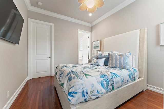 bedroom featuring ceiling fan, hardwood / wood-style floors, and ornamental molding