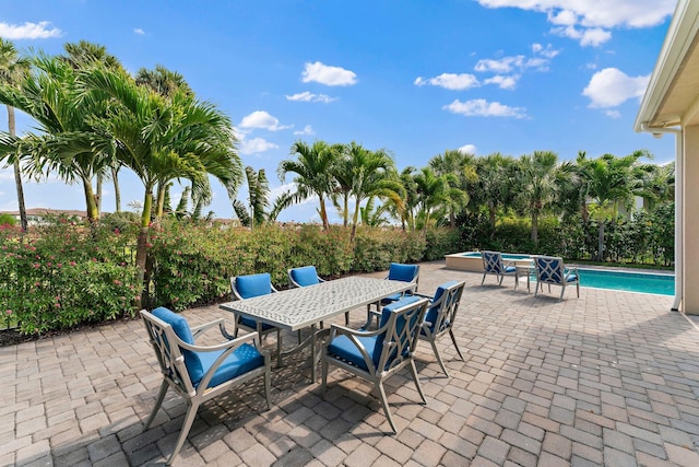 view of patio / terrace featuring a fenced in pool