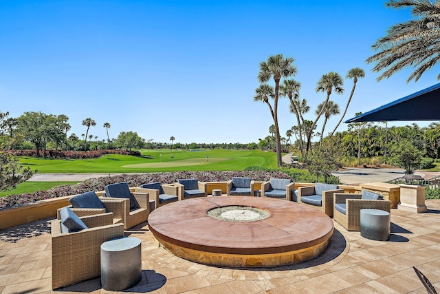 view of patio / terrace featuring an outdoor fire pit