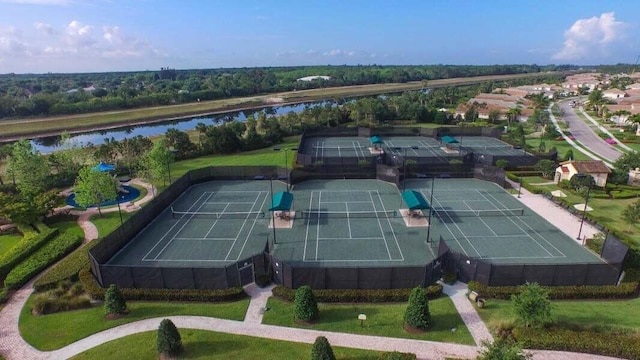 birds eye view of property with a water view