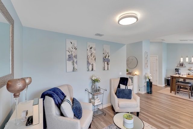 living room featuring light wood-type flooring