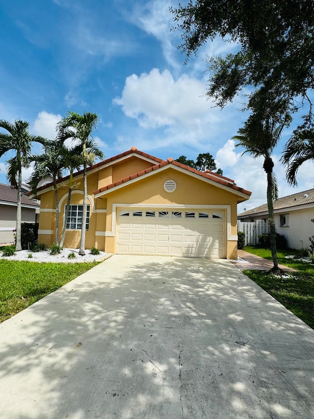 view of front of home featuring a garage