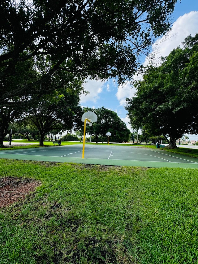 view of yard featuring basketball court