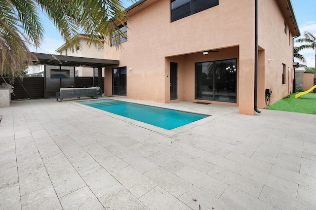 view of pool featuring a patio, a pergola, and a hot tub