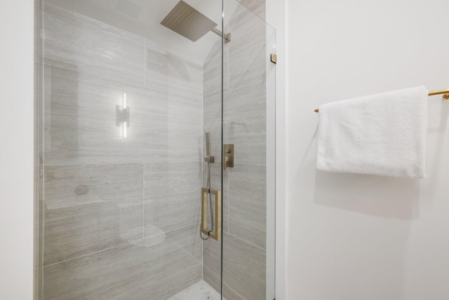 bathroom featuring an enclosed shower