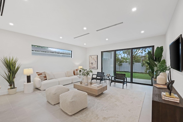 living room featuring light tile patterned floors