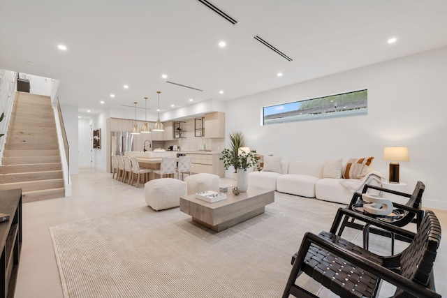 living room featuring sink