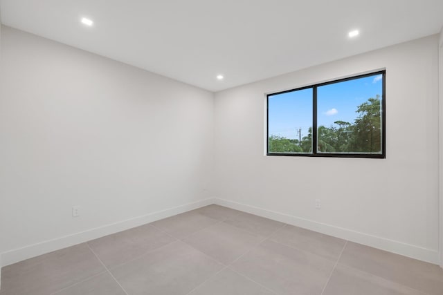 view of tiled spare room