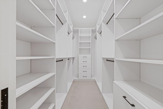 walk in closet featuring light tile patterned floors