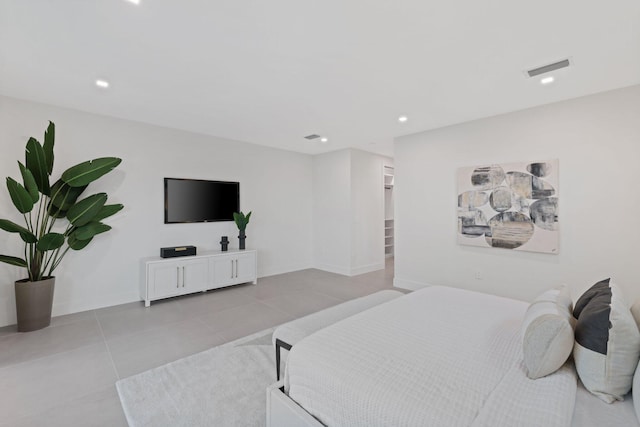 bedroom with light tile patterned flooring