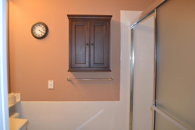 bathroom featuring an enclosed shower