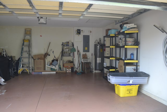 garage featuring electric panel, a garage door opener, and water heater