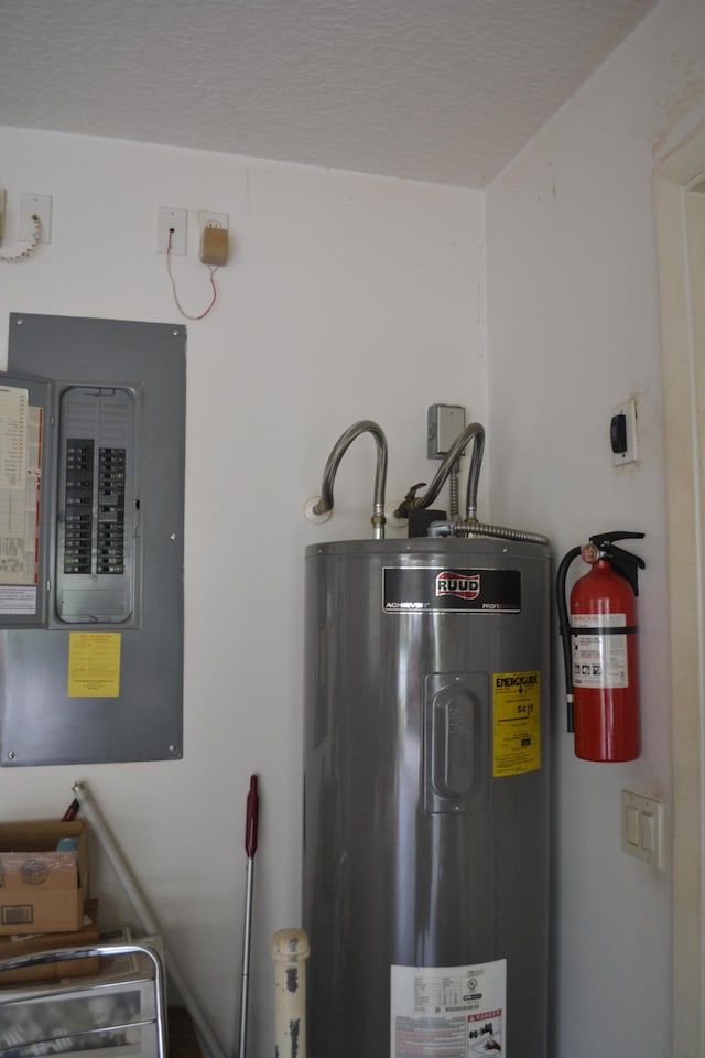 utilities featuring water heater and electric panel