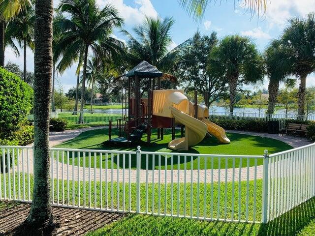 view of playground featuring a lawn