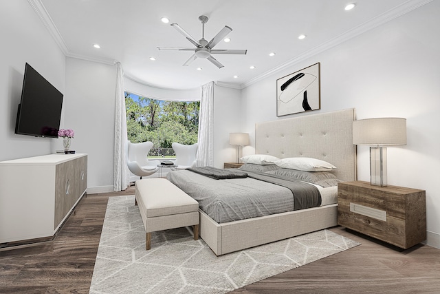 bedroom featuring ceiling fan, hardwood / wood-style flooring, and ornamental molding