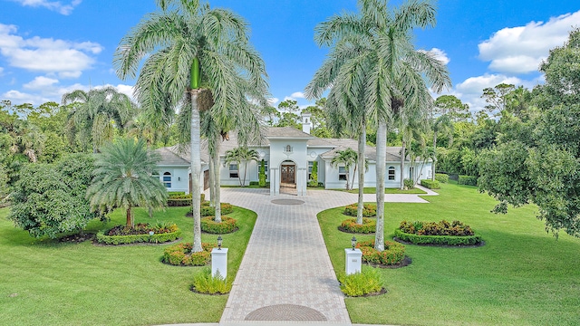 view of community featuring a yard