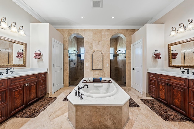 full bathroom featuring a stall shower, crown molding, visible vents, and a sink