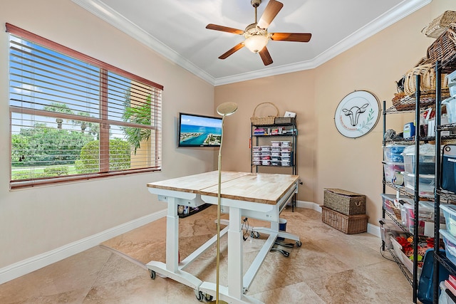 office space with a ceiling fan, baseboards, and crown molding