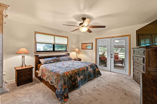 carpeted bedroom with ceiling fan, french doors, and access to outside