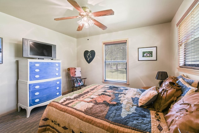 bedroom featuring dark wood-type flooring and ceiling fan