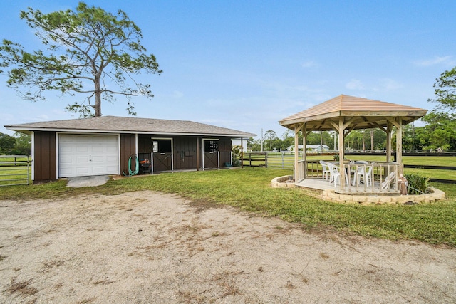 12390 Sandy Run, Jupiter, FL 33478 - view of outbuilding with a gazebo, dirt driveway, and an exterior structure