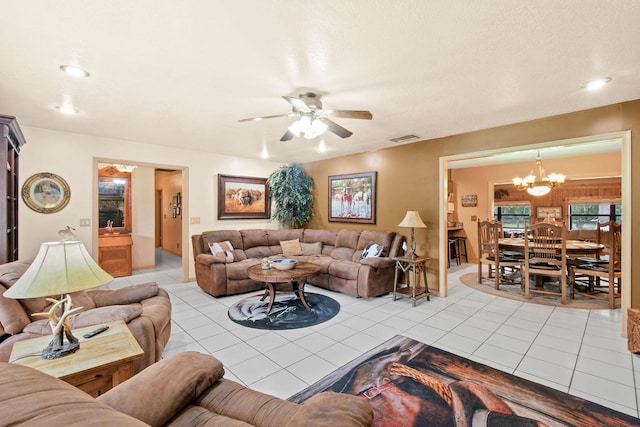12390 Sandy Run, Jupiter, FL 33478 - living area with light tile patterned floors, a chandelier, ceiling fan, and recessed lighting