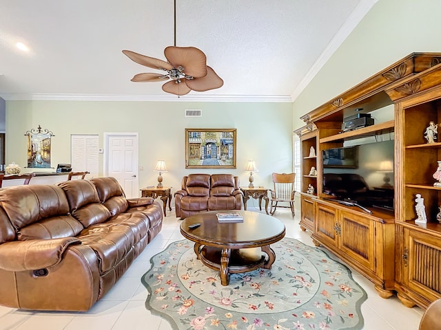 tiled living room with ceiling fan, crown molding, and lofted ceiling