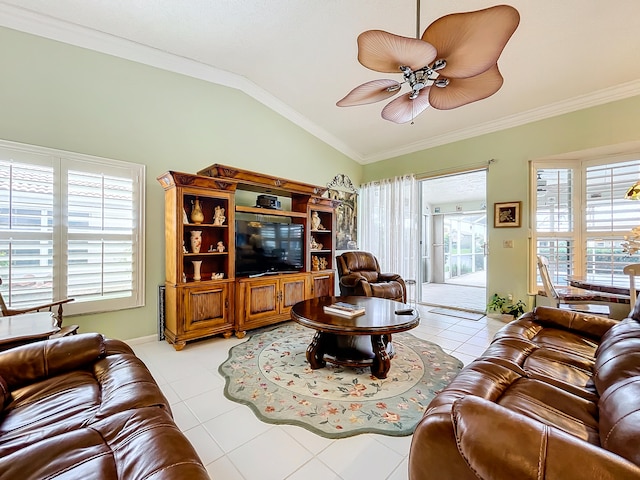 living room featuring vaulted ceiling, crown molding, plenty of natural light, and light tile patterned floors