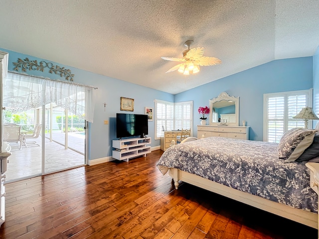 bedroom with hardwood / wood-style floors, lofted ceiling, ceiling fan, and access to exterior