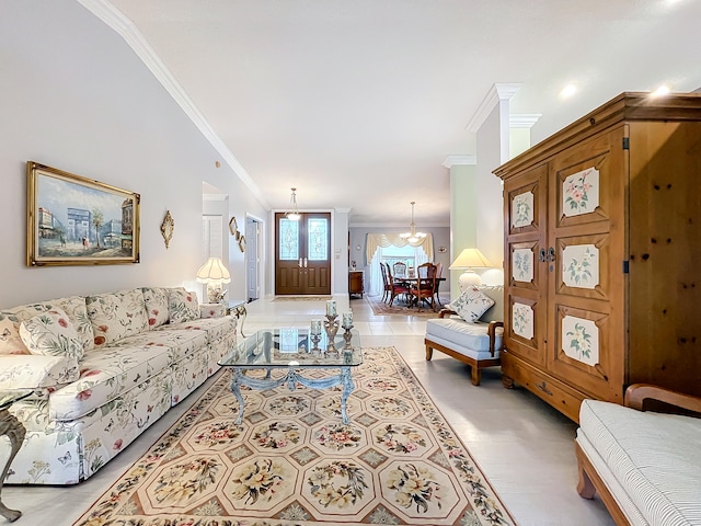 living room with crown molding, light tile patterned floors, and an inviting chandelier