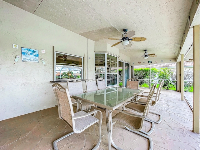 view of patio / terrace featuring ceiling fan