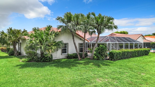 view of yard featuring a lanai