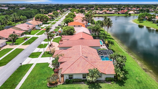 drone / aerial view with a water view