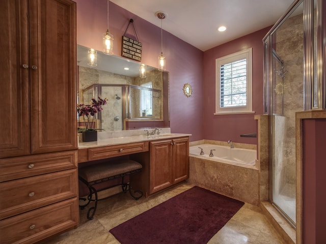 bathroom featuring vanity and separate shower and tub