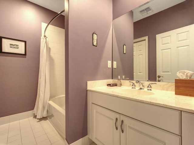 bathroom featuring shower / bath combination with curtain, vanity, and tile patterned floors