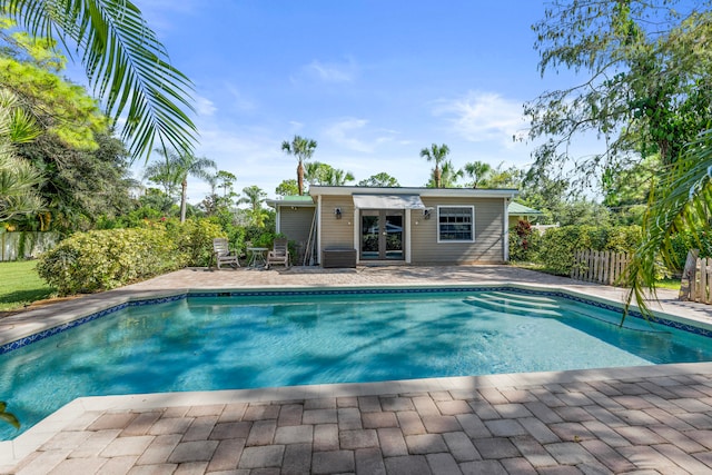 view of pool featuring a patio area