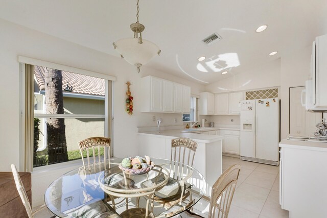 interior space with vaulted ceiling and ceiling fan